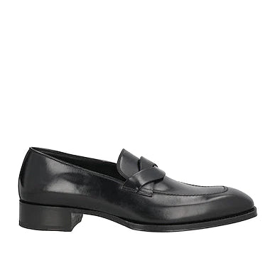 Black loafer shoe on a white background