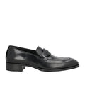 Black loafer shoe on a white background
